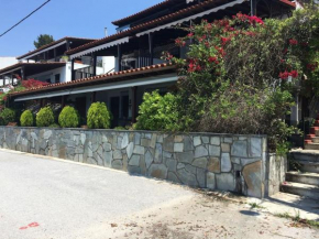 Beach house in front of the sea